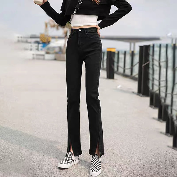 Kahes värvitoonis lõhiku ja taskuga naiste teksad