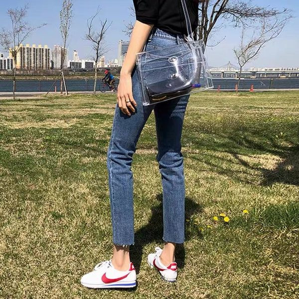 Női farmer letisztult modell, szárán szakadt motívumok