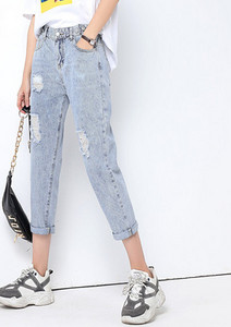 Új női farmer szakadt motívumokkal