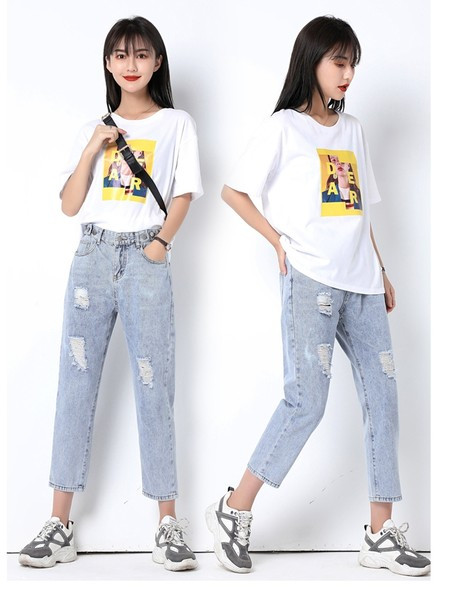 Új női farmer szakadt motívumokkal