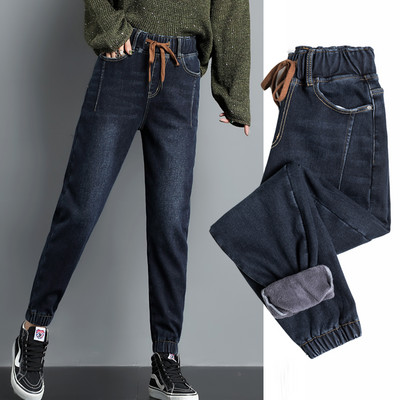 Női farmermodell gumírozással és zsebbel