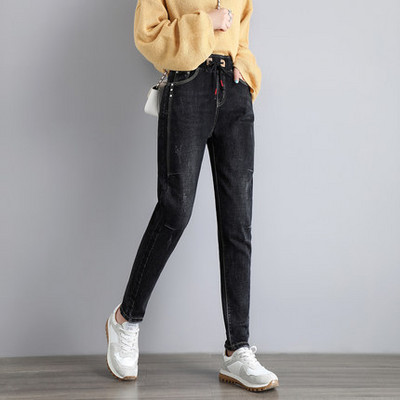 Női farmer zsebbel és nyakkendővel