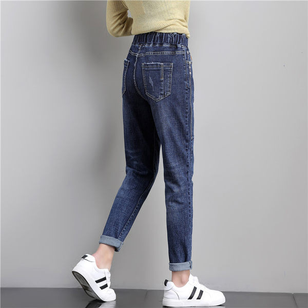 Női farmer zsebbel és nyakkendővel