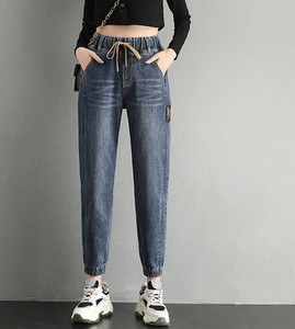 Naiste teksad kõrge vöökohaga lipsudega ja kummiga säärtes