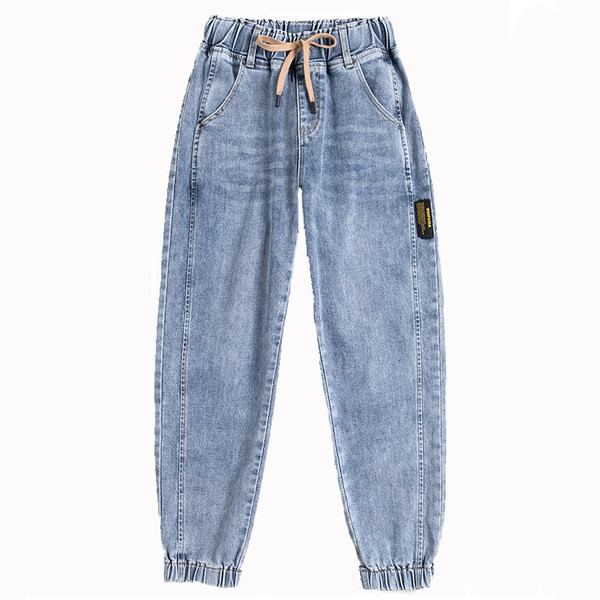 Naiste teksad kõrge vöökohaga lipsudega ja kummiga säärtes