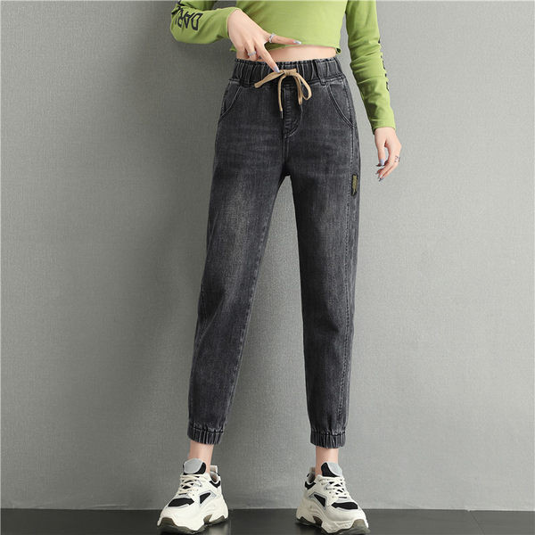 Naiste teksad kõrge vöökohaga lipsudega ja kummiga säärtes