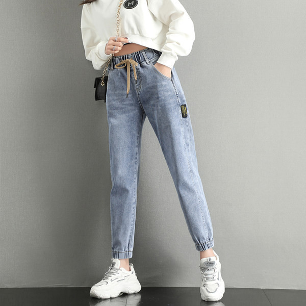 Naiste teksad kõrge vöökohaga lipsudega ja kummiga säärtes