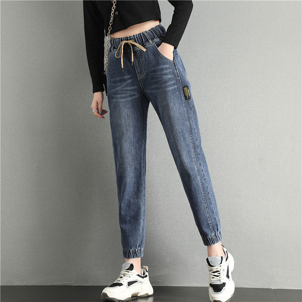 Naiste teksad kõrge vöökohaga lipsudega ja kummiga säärtes