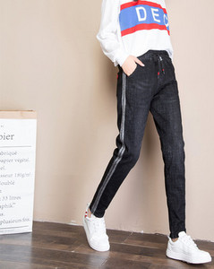 Γυναικείο τζιν με κορδόνια και στρίφωμα σε δύο χρώματα