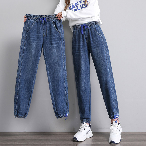 Moteriški džinsai aukštu liemeniu su raišteliais ir kišene