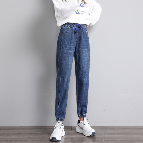 Moteriški džinsai aukštu liemeniu su raišteliais ir kišene