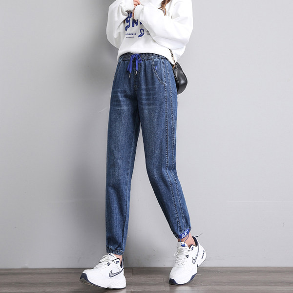 Moteriški džinsai aukštu liemeniu su raišteliais ir kišene