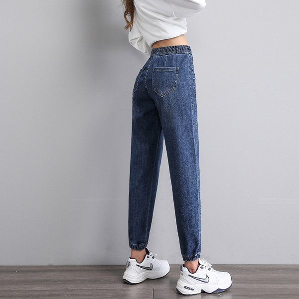 Moteriški džinsai aukštu liemeniu su raišteliais ir kišene