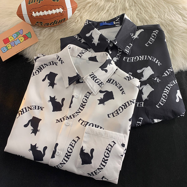 Lühikeste varrukate ja trükiga meeste särk