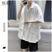 Platūs vyriški marškiniai su kišenėmis – juodos ir baltos spalvos