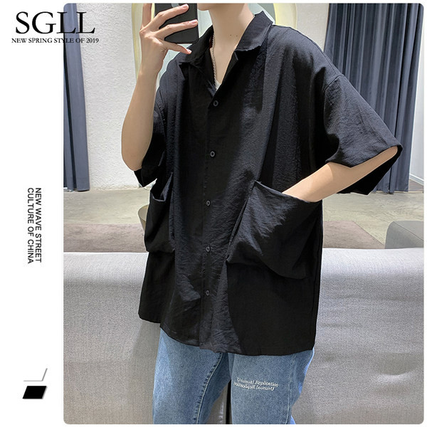 Platūs vyriški marškiniai su kišenėmis – juodos ir baltos spalvos