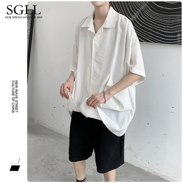 Platūs vyriški marškiniai su kišenėmis – juodos ir baltos spalvos