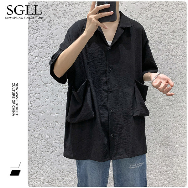 Platūs vyriški marškiniai su kišenėmis – juodos ir baltos spalvos