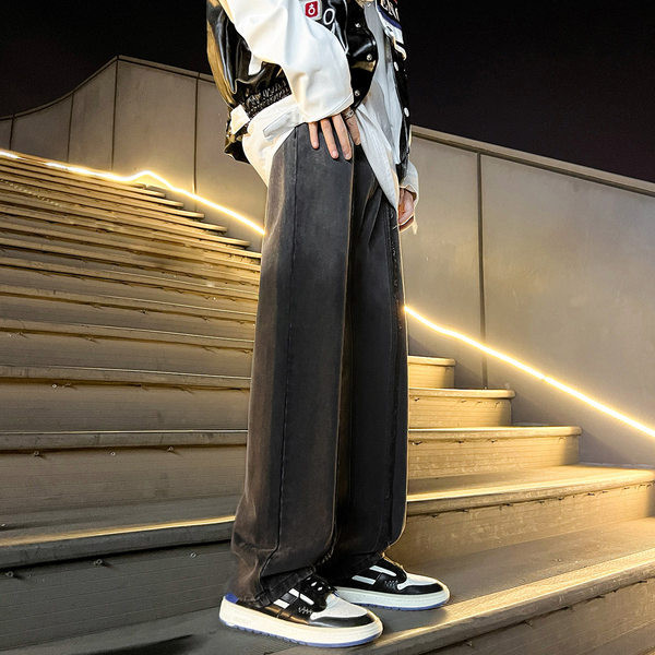 Dviejų spalvų vyriški džinsai su plėšytais motyvais