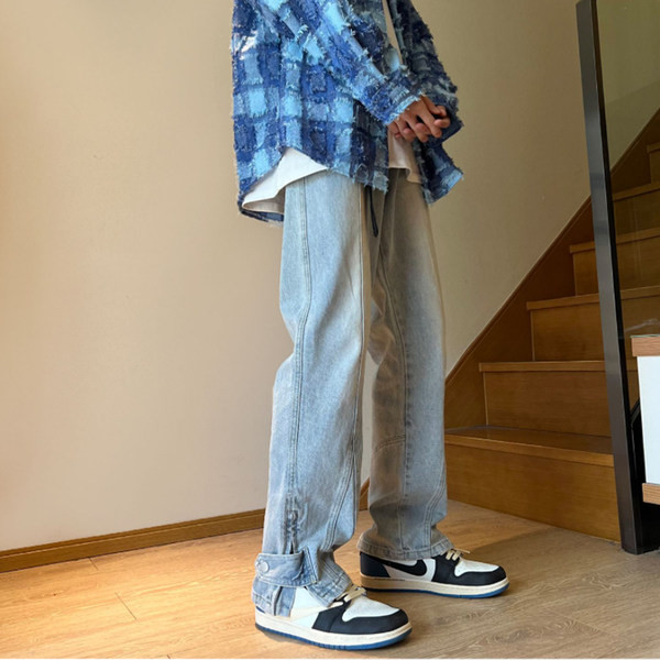 Ανδρικό κομψό τζιν με σκισίματα στα πόδια και κούμπωμα με φερμουάρ και κουμπί