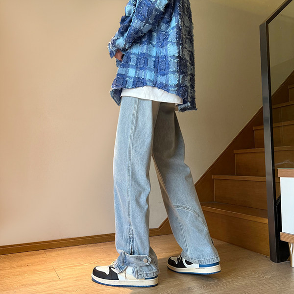 Ανδρικό κομψό τζιν με σκισίματα στα πόδια και κούμπωμα με φερμουάρ και κουμπί