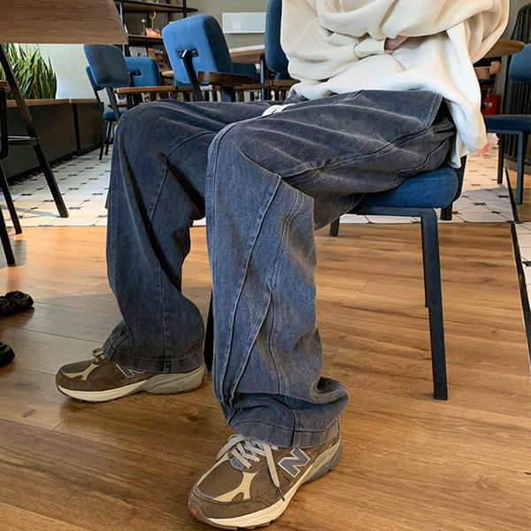 Laia istuvusega meeste teksad tikitud kirja ja paeltega