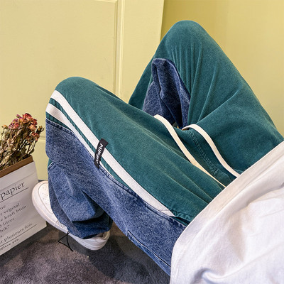 Meeste teksapükste lai ääristega mudel