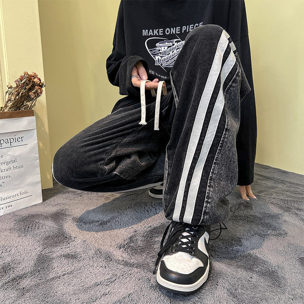 Meeste teksapükste lai ääristega mudel