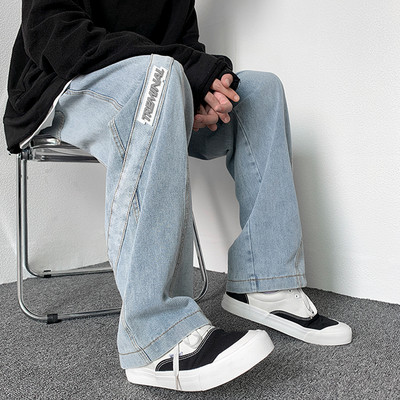 Férfi alkalmi farmernadrág varrással