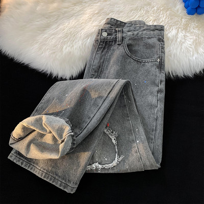 Vyriški džinsai plačiomis kojomis su plėšytais motyvais ir kišene