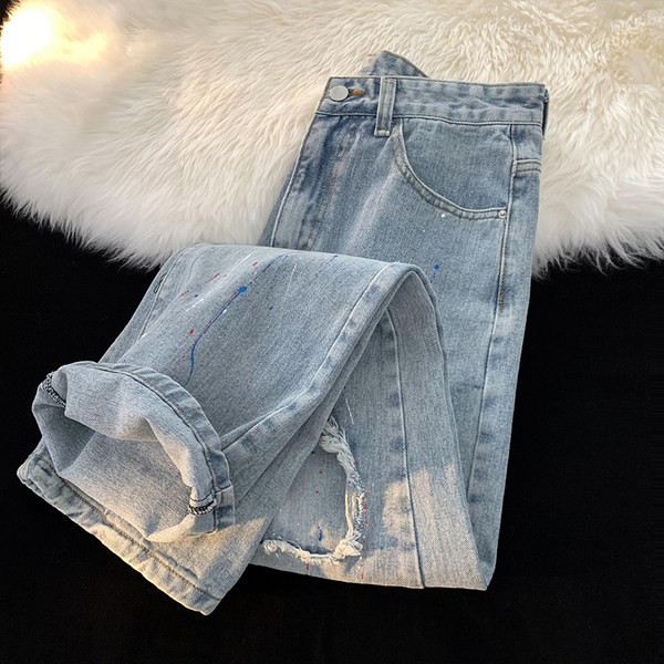 Vyriški džinsai plačiomis kojomis su plėšytais motyvais ir kišene