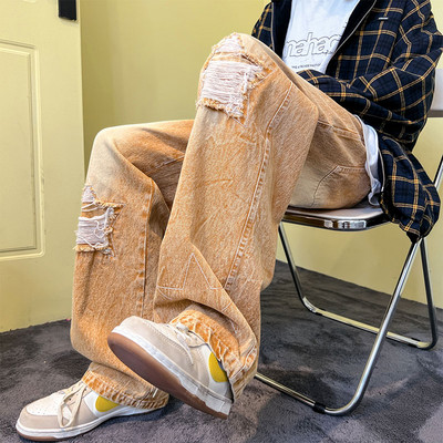 Férfi farmer fűzős, szakadt motívumokkal