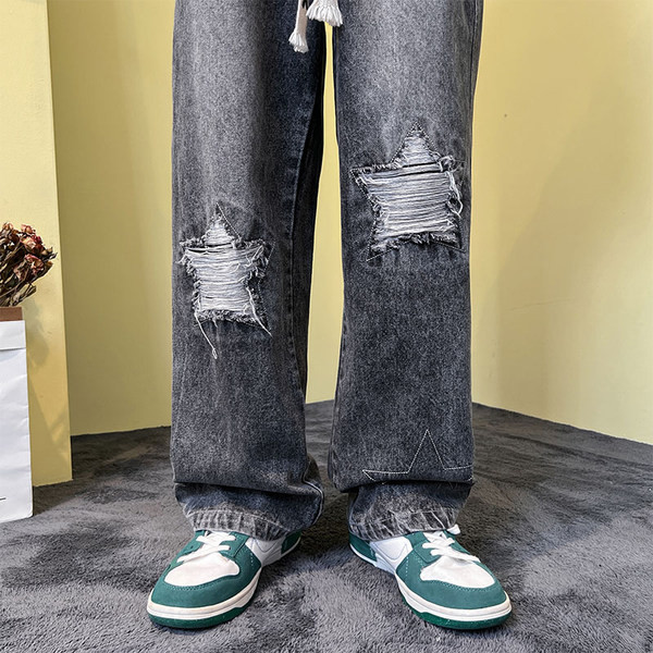 Férfi farmer fűzős, szakadt motívumokkal