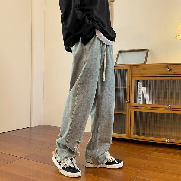 Ανδρικό τζιν με κορδόνια και σκισμένα μοτίβα στα πόδια