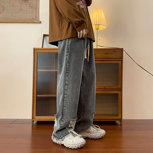 Ανδρικό τζιν με κορδόνια και σκισμένα μοτίβα στα πόδια