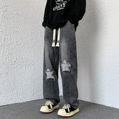 Laia istuvusega meeste teksad, millel on rebenenud motiivid ja paelad