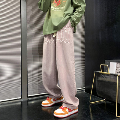 Paelte ja trükiga meeste teksad