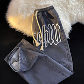 Мъжки дънки с бродиран надпис и връзки