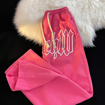 Мъжки дънки с бродиран надпис и връзки