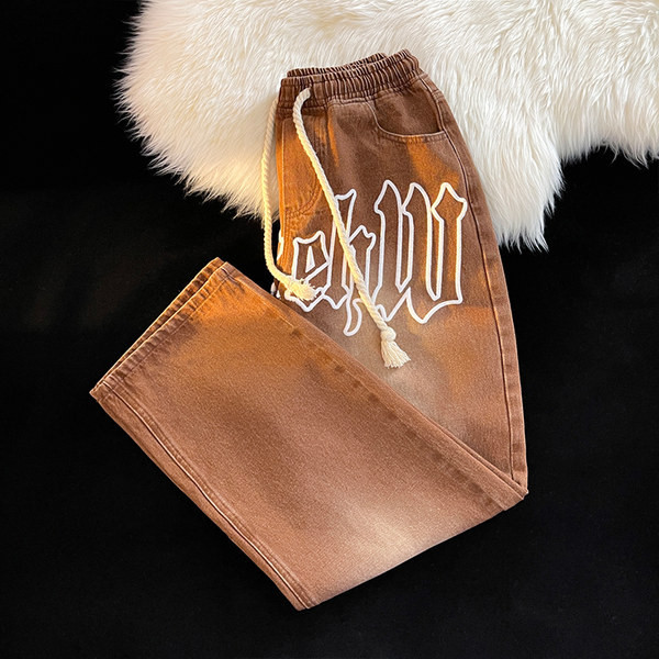 Мъжки дънки с бродиран надпис и връзки