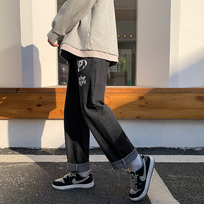 Kahes värvitoonis kirjaga meeste teksad