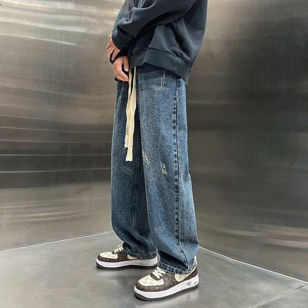 Laia mudeliga meeste teksad paelte ja taskuga