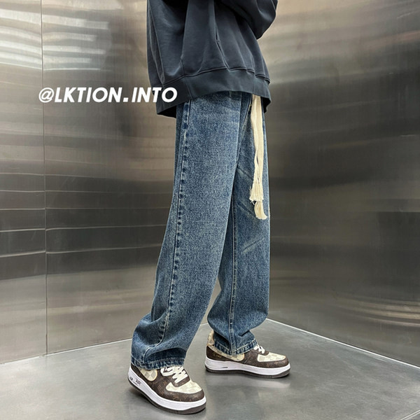 Laia mudeliga meeste teksad paelte ja taskuga