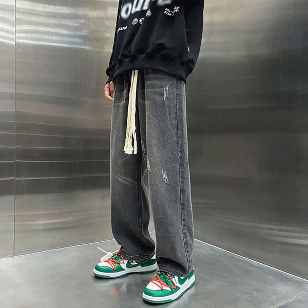 Laia mudeliga meeste teksad paelte ja taskuga