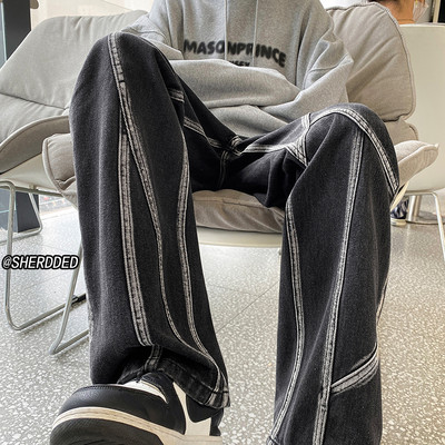 Kahes värvitoonis õmblustega meeste teksad