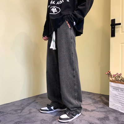 Vyriški džinsai su raišteliais ir plačiomis kojomis