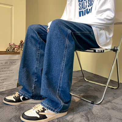 Vyriški džinsai su raišteliais ir plačiomis kojomis