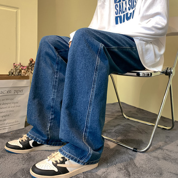 Vyriški džinsai su raišteliais ir plačiomis kojomis