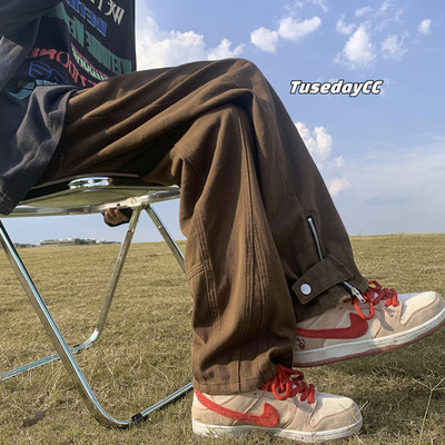 Vyriški plataus modelio džinsai su užtrauktuku ir sagute ant kojų