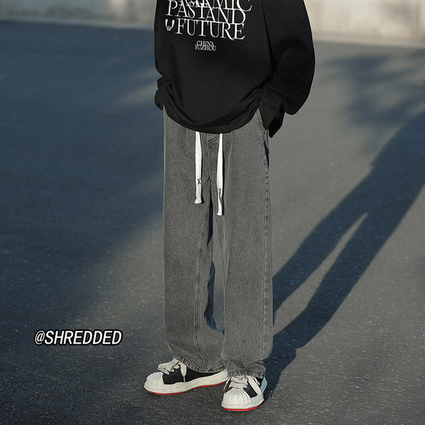 Ανδρικό στενό τζιν με κορδόνια και τσέπη